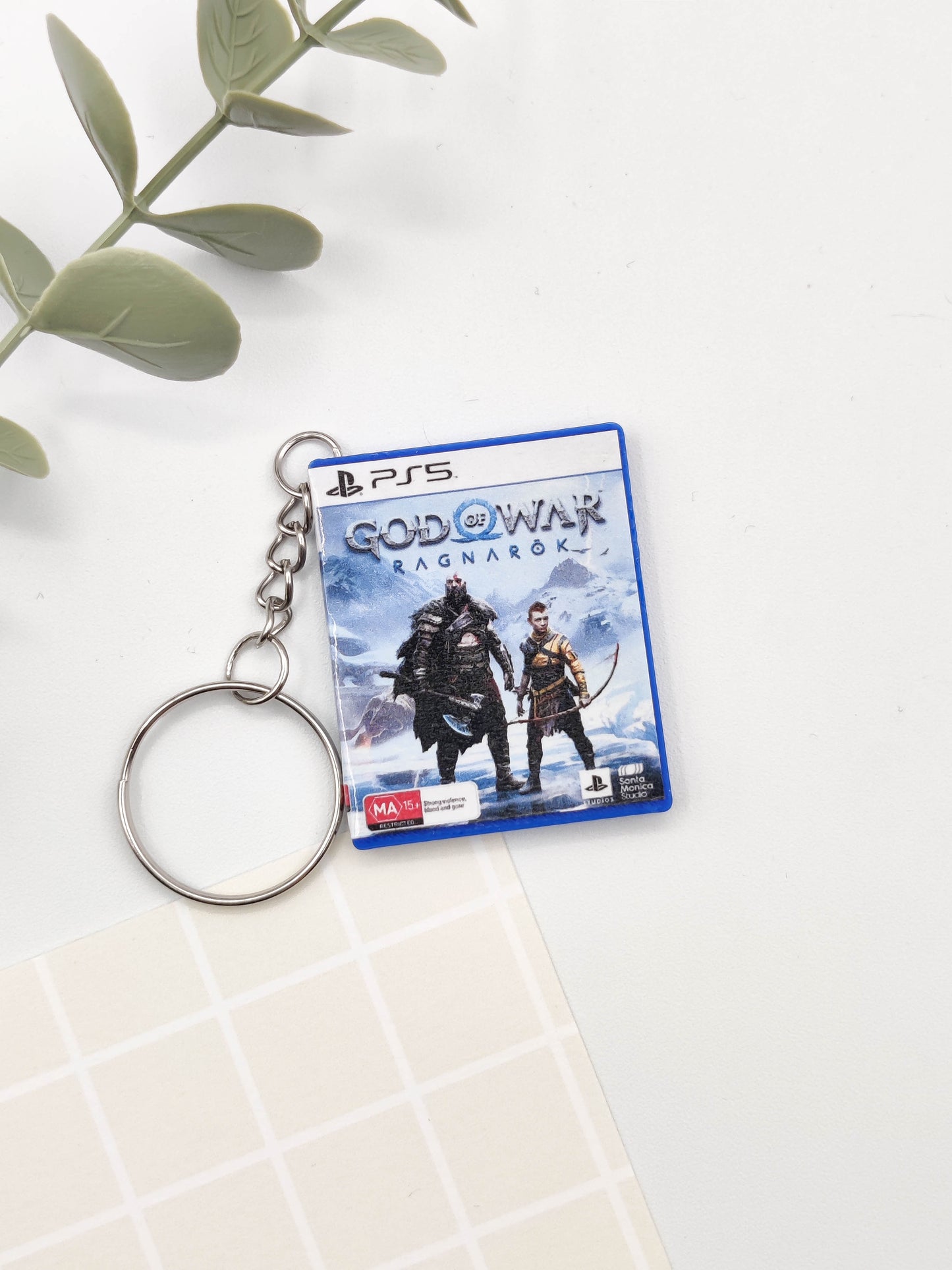 Llavero caja juego PS5 - God of War Ragnarok