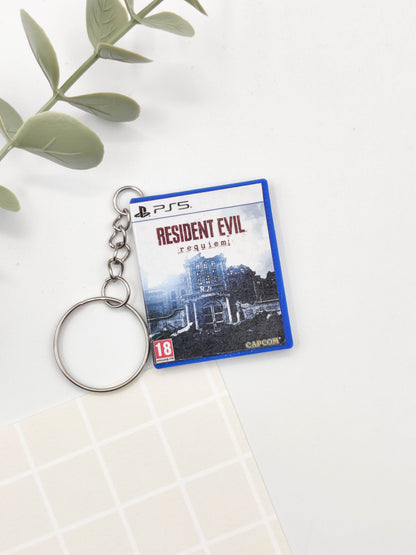 Llavero caja juego PS5 - Resident Evil Requiem