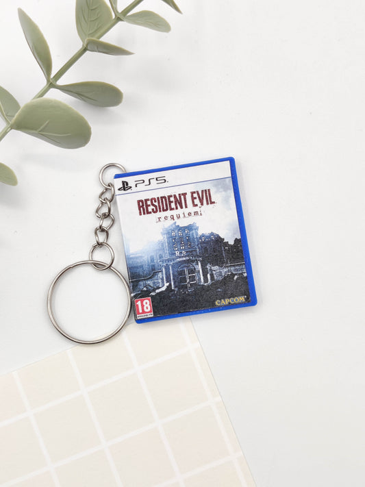 Llavero caja juego PS5 - Resident Evil Requiem