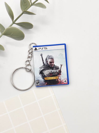 Llavero caja juego PS5 - The Witcher