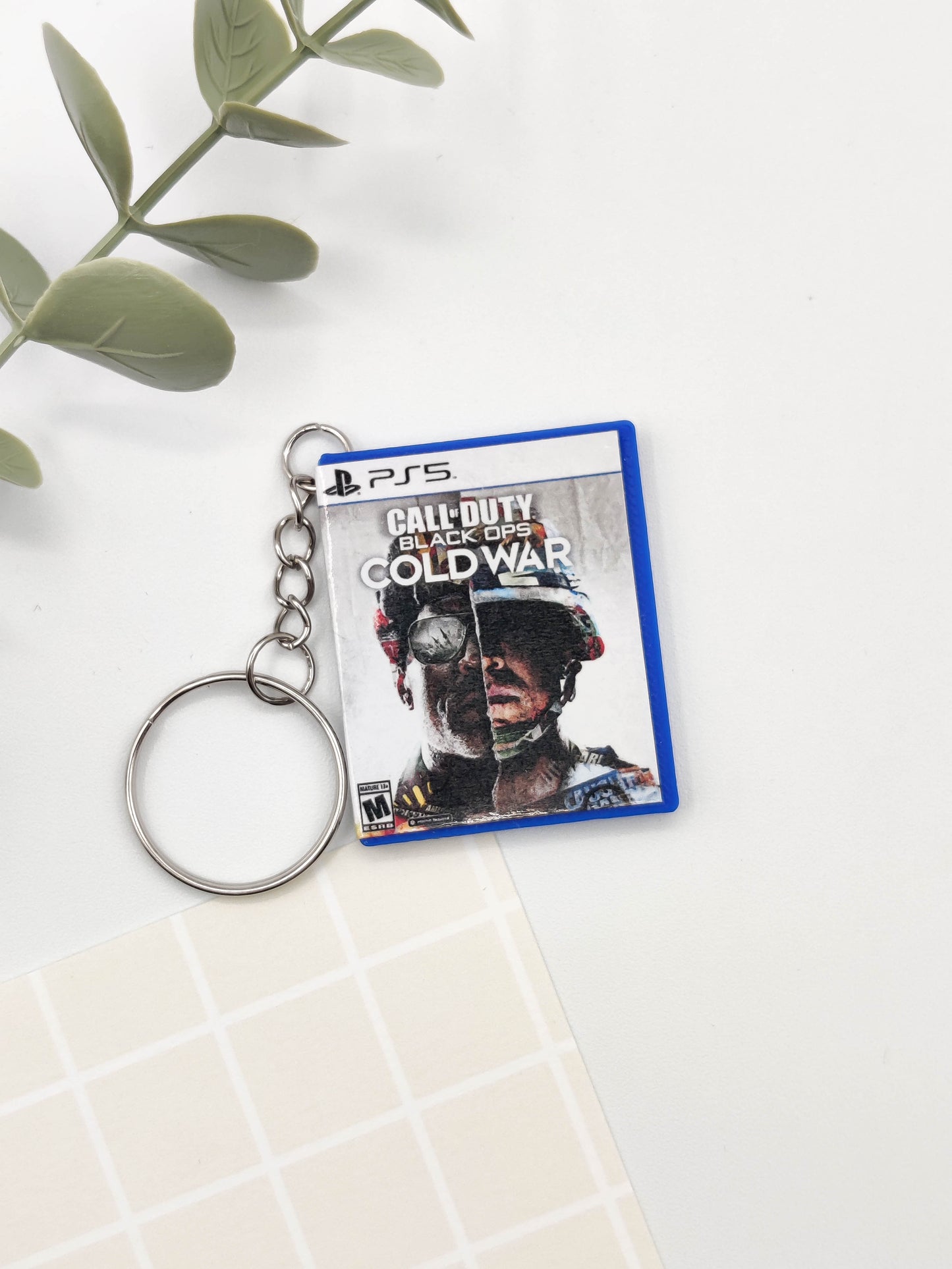 Llavero caja juego PS5 - Call of Duty Black Ops