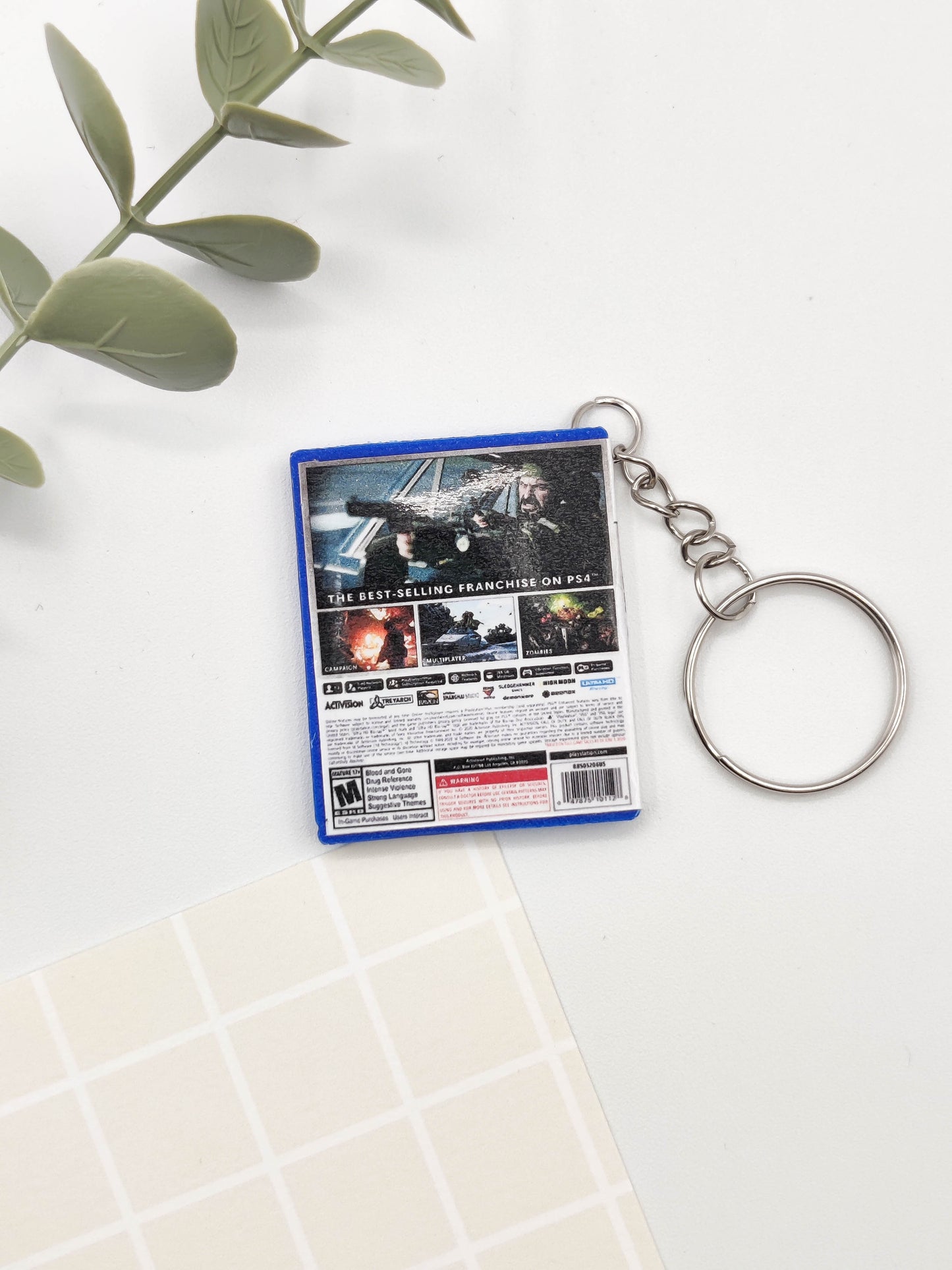 Llavero caja juego PS5 - Call of Duty Black Ops