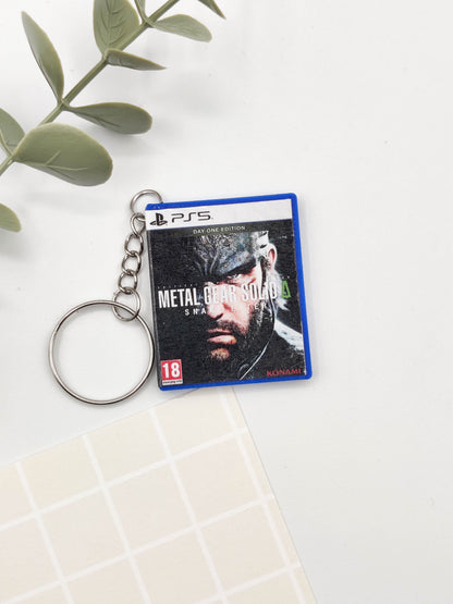 Llavero caja juego PS5 - Metal Gear Solid