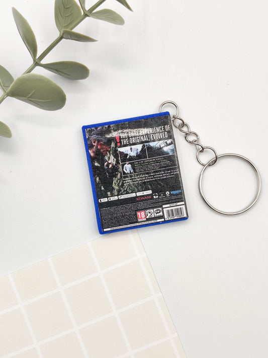 Llavero caja juego PS5 - Metal Gear Solid
