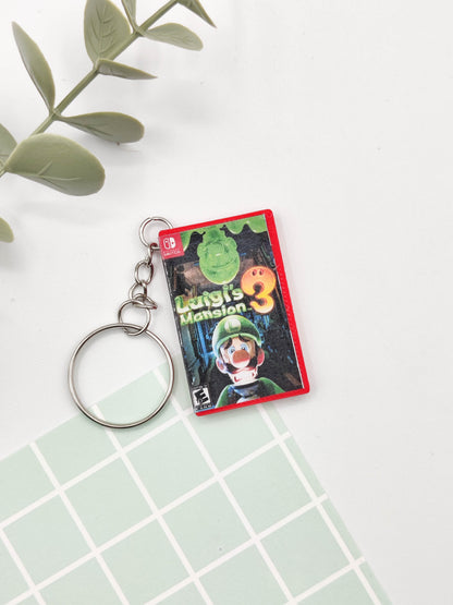 Llavero caja juego Switch - Luigi's Mansion