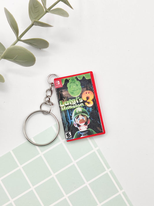 Llavero caja juego Switch - Luigi's Mansion